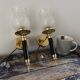 Pair of brass and black torchiere wall lights