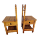 2 old wooden children's chairs with a small chest.