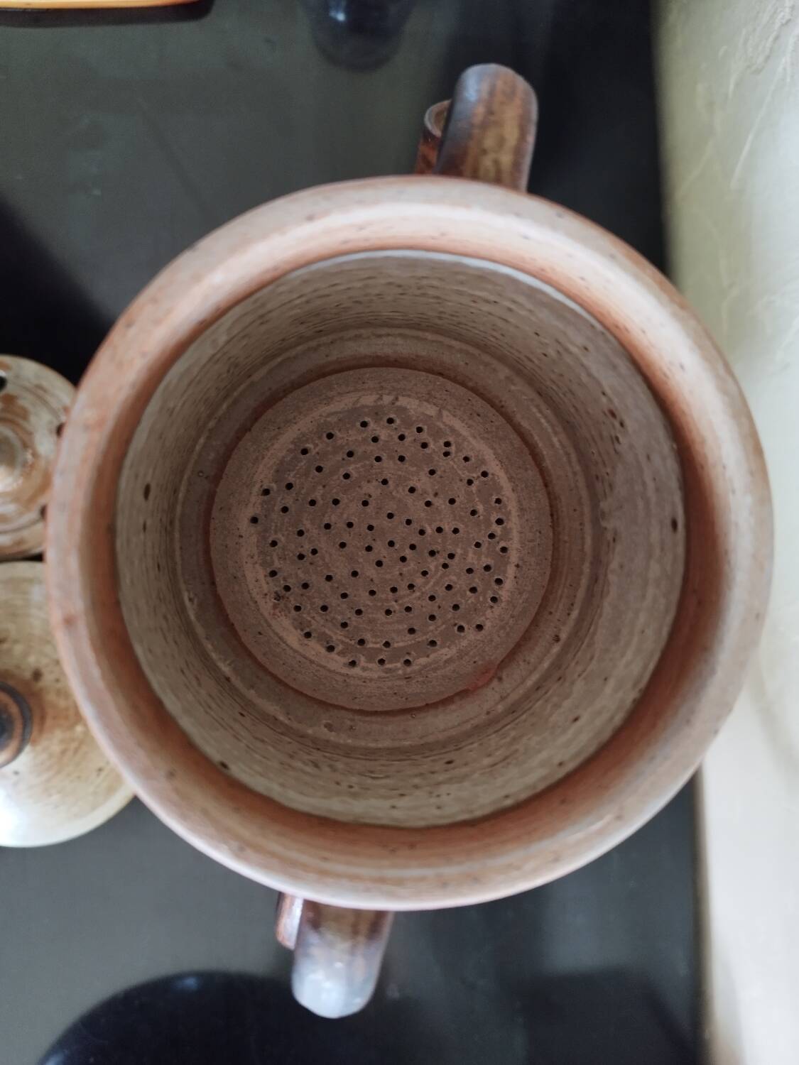 Stoneware coffee pot with filter