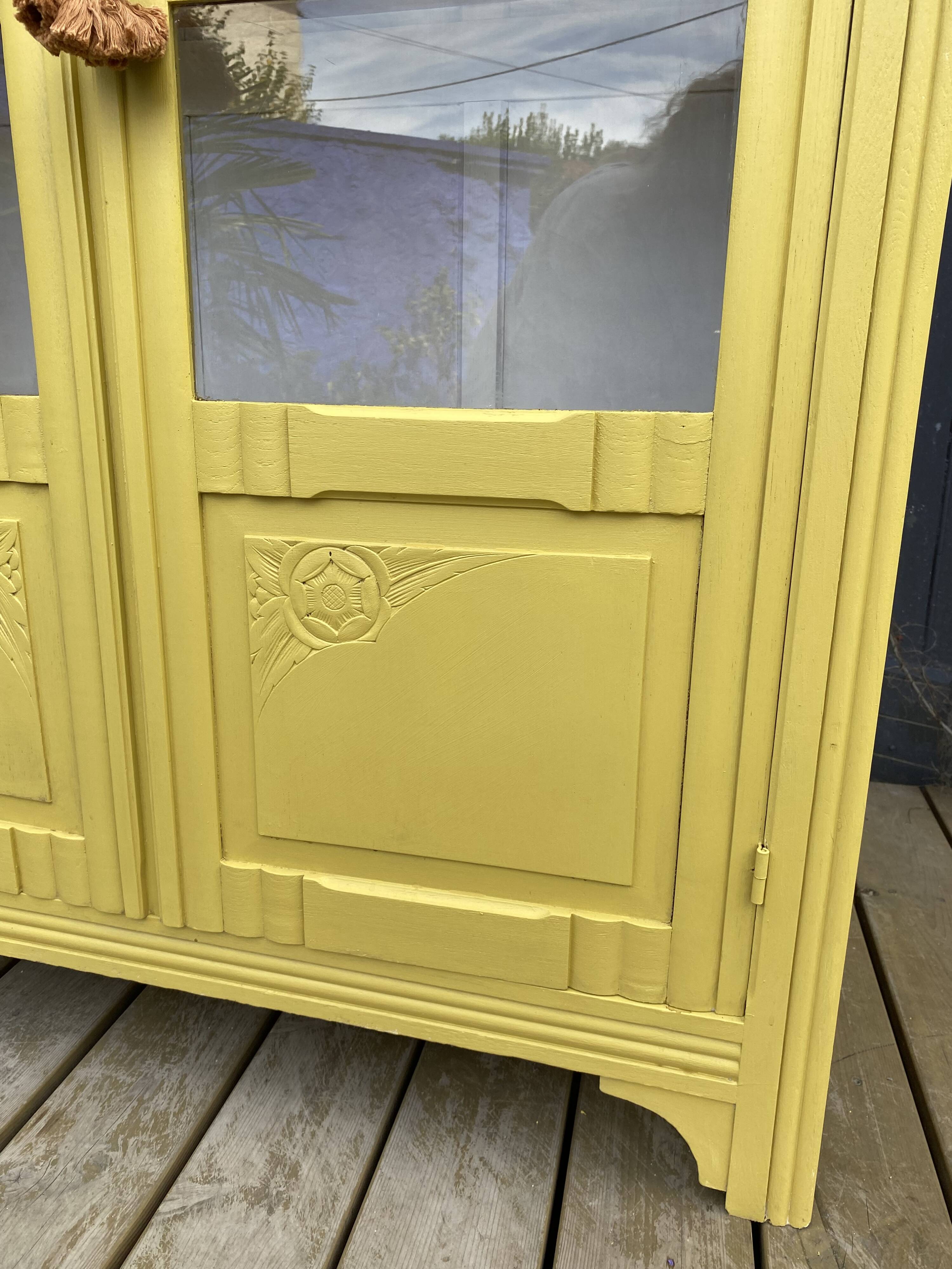 Antique yellow display cabinet
