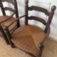 Paire de fauteuils en bois et paille  Charles Dudouyt 