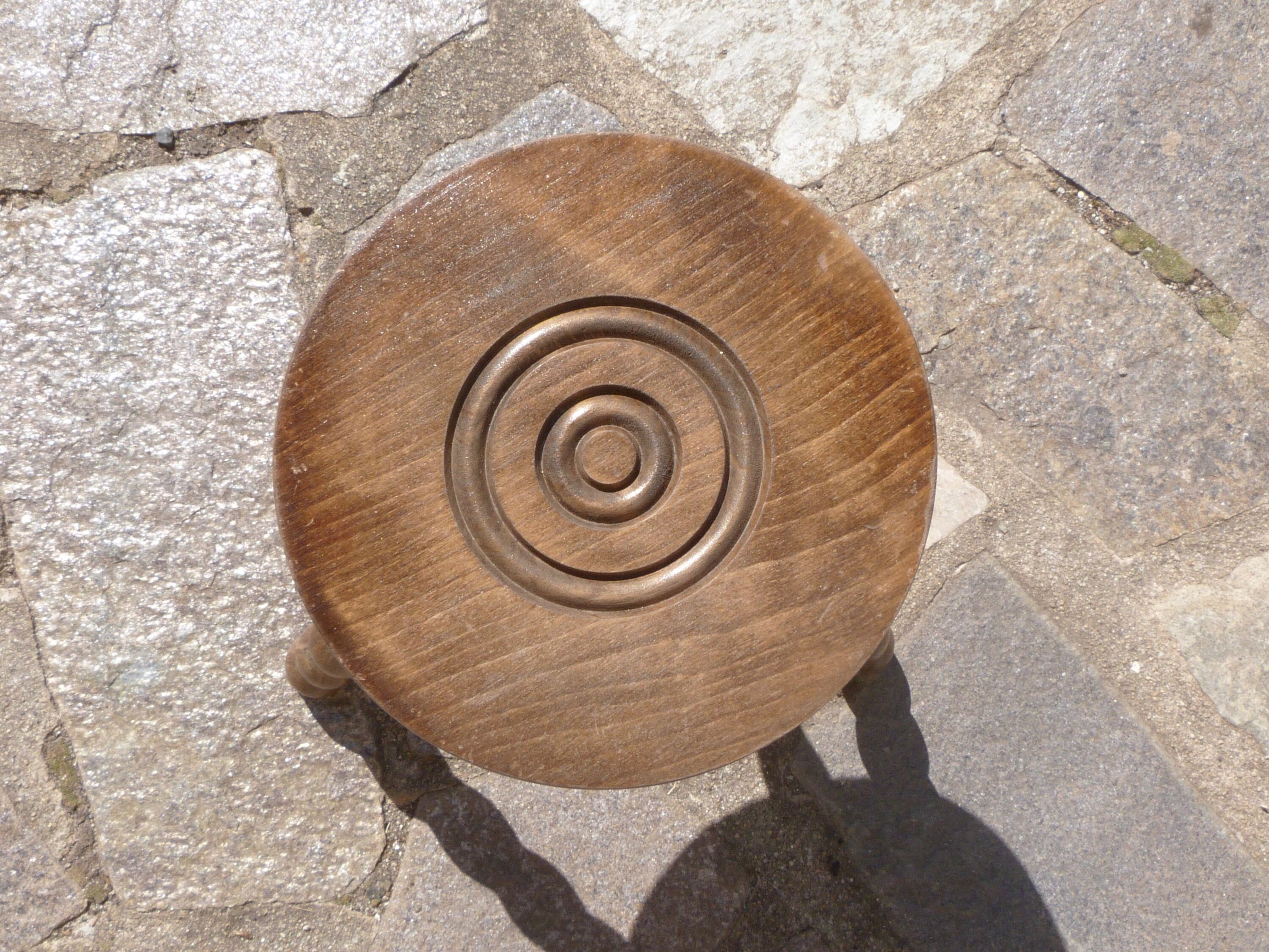 Tripod stool in turned wood