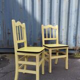 Pair of wooden and yellow formica chairs