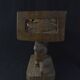 Togolese ethnic stool in carved exotic wood.