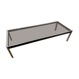 Large designer coffee table from the 70s in chrome, smoked glass, and faux leather.