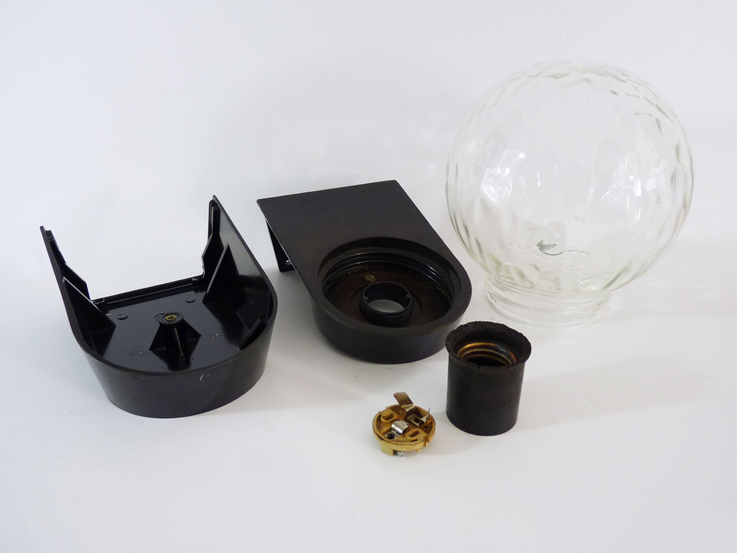 Vintage wall light plastic or bakelite structure, transparent glass globe. Year 70