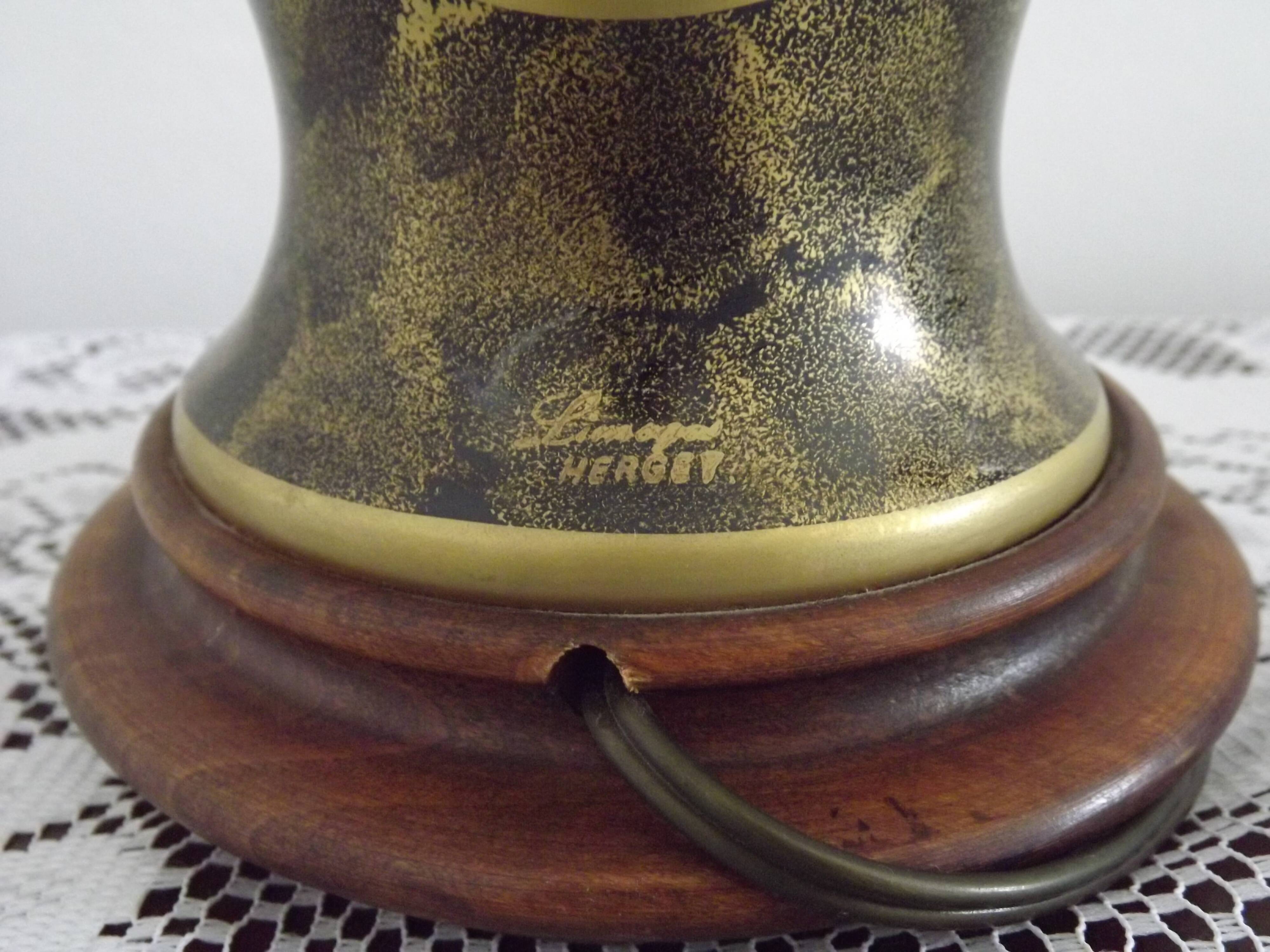 French Limoges Hergé table lamp base with gold highlights and floral decoration.