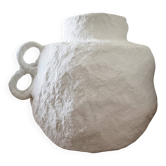 Sculptural vase with a mineral Boho spirit.