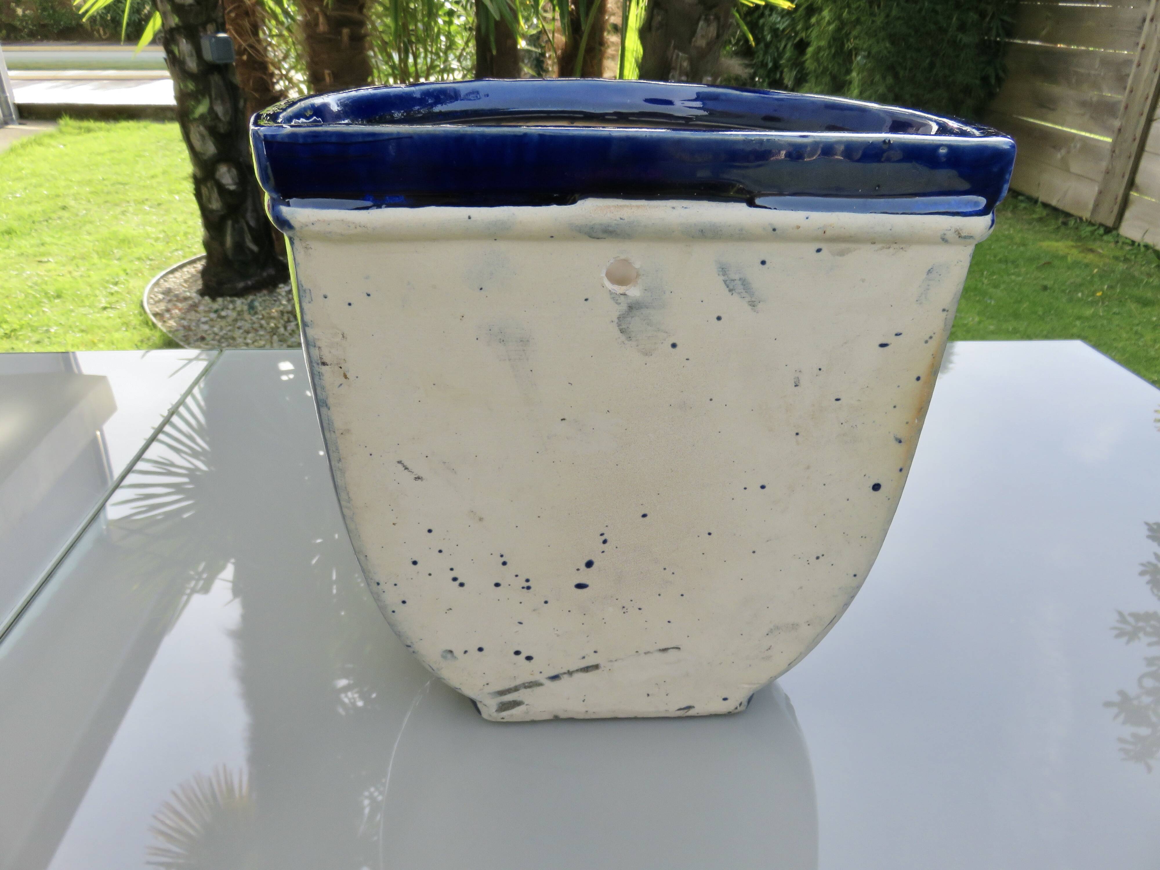 Wall pot in glazed blue terracotta with a grape motif, 1970s.