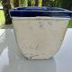 Wall pot in glazed blue terracotta with a grape motif, 1970s.