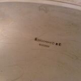 Flat oval silver metal