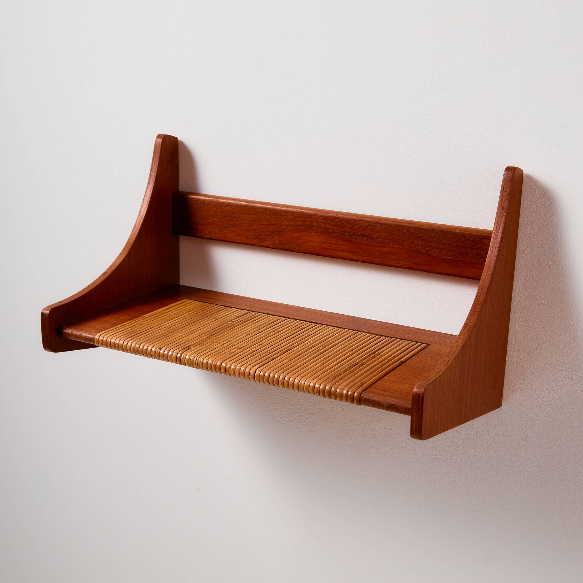 Teak wall shelf with cane details