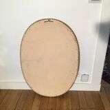 Golden mirror decorated with water leaves and palmettes