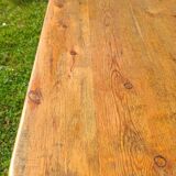 Solid oak coffee table with turned legs.