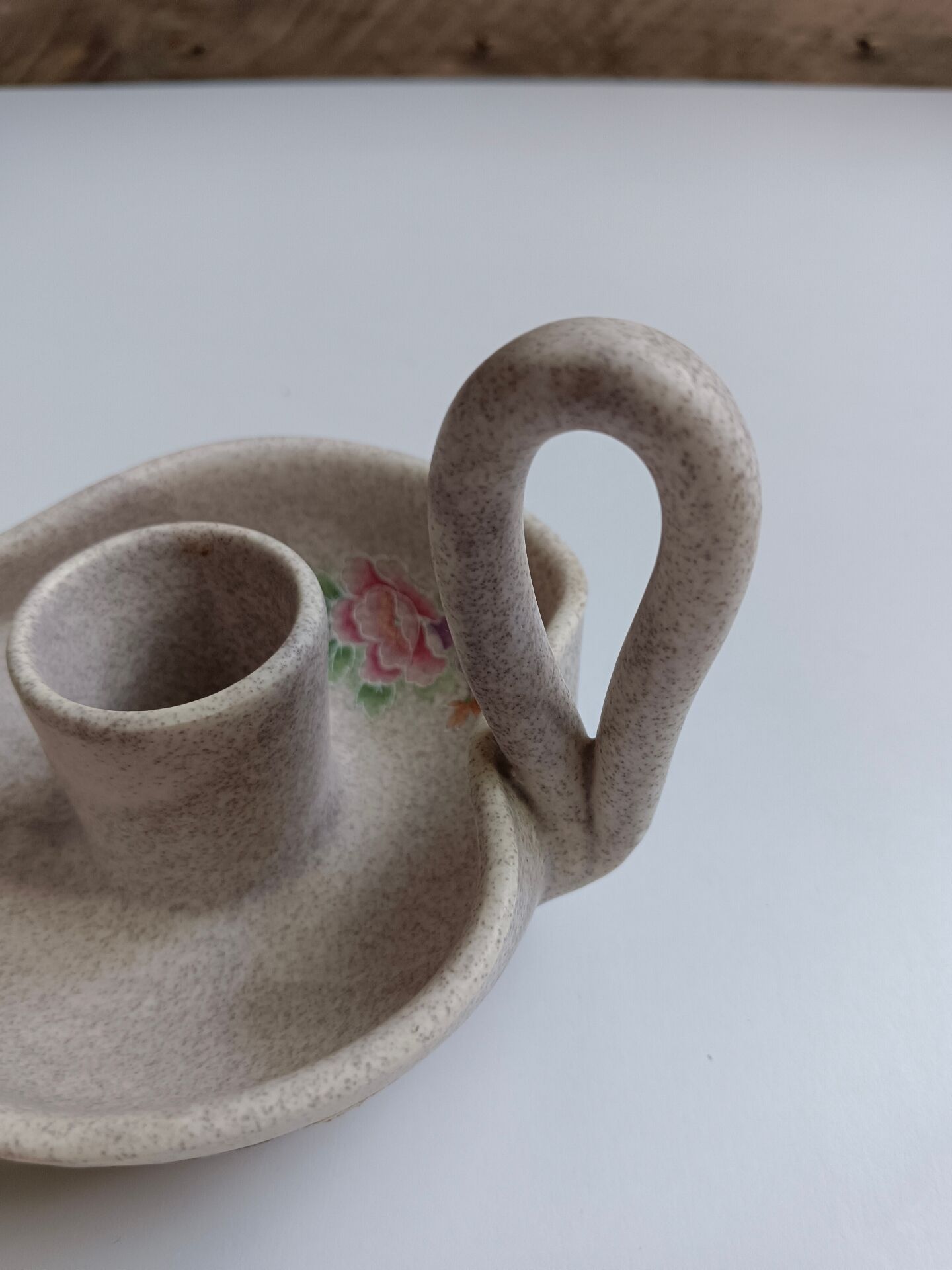 Vallauris grey candle holder with pink flowers, signed.