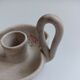 Vallauris grey candle holder with pink flowers, signed.