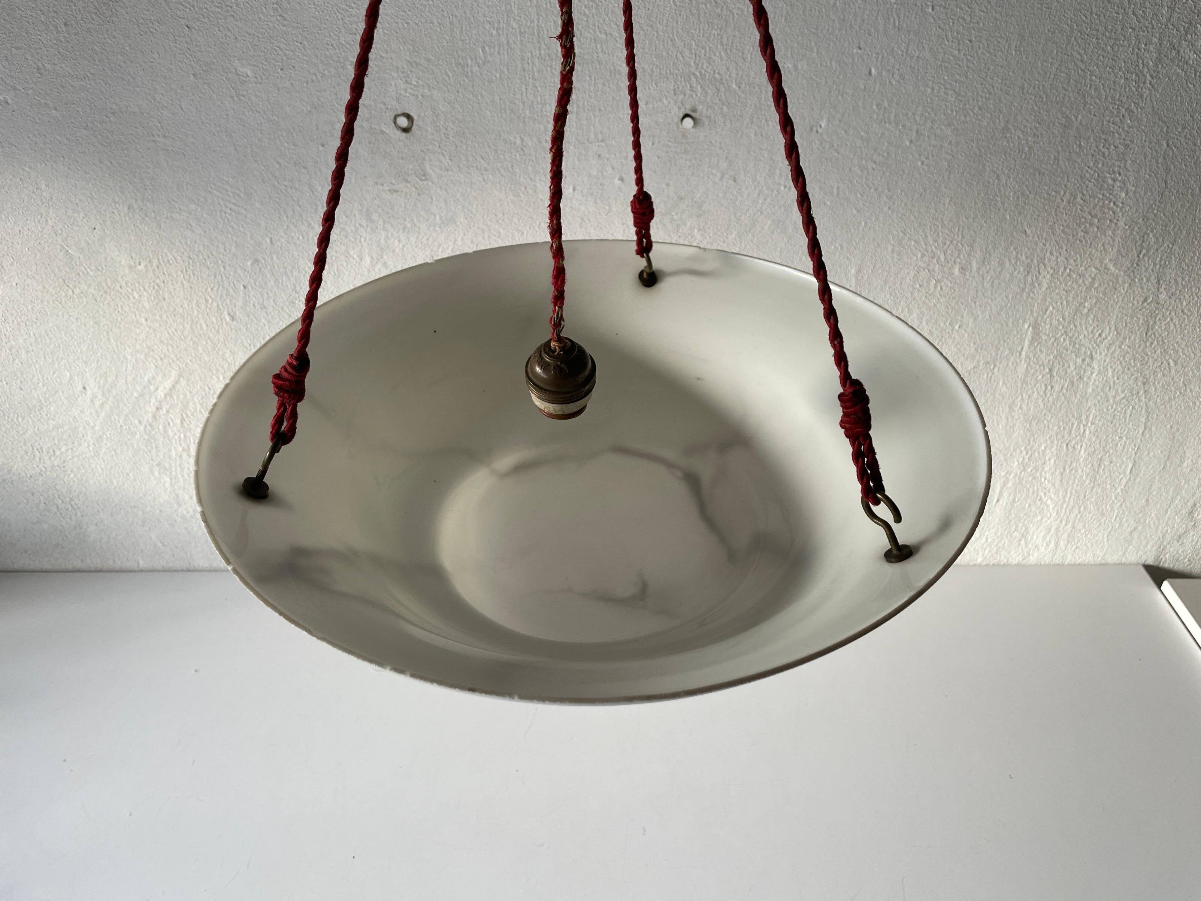 Art Deco suspended lamp in white marble-effect glass, 1940s, Germany.