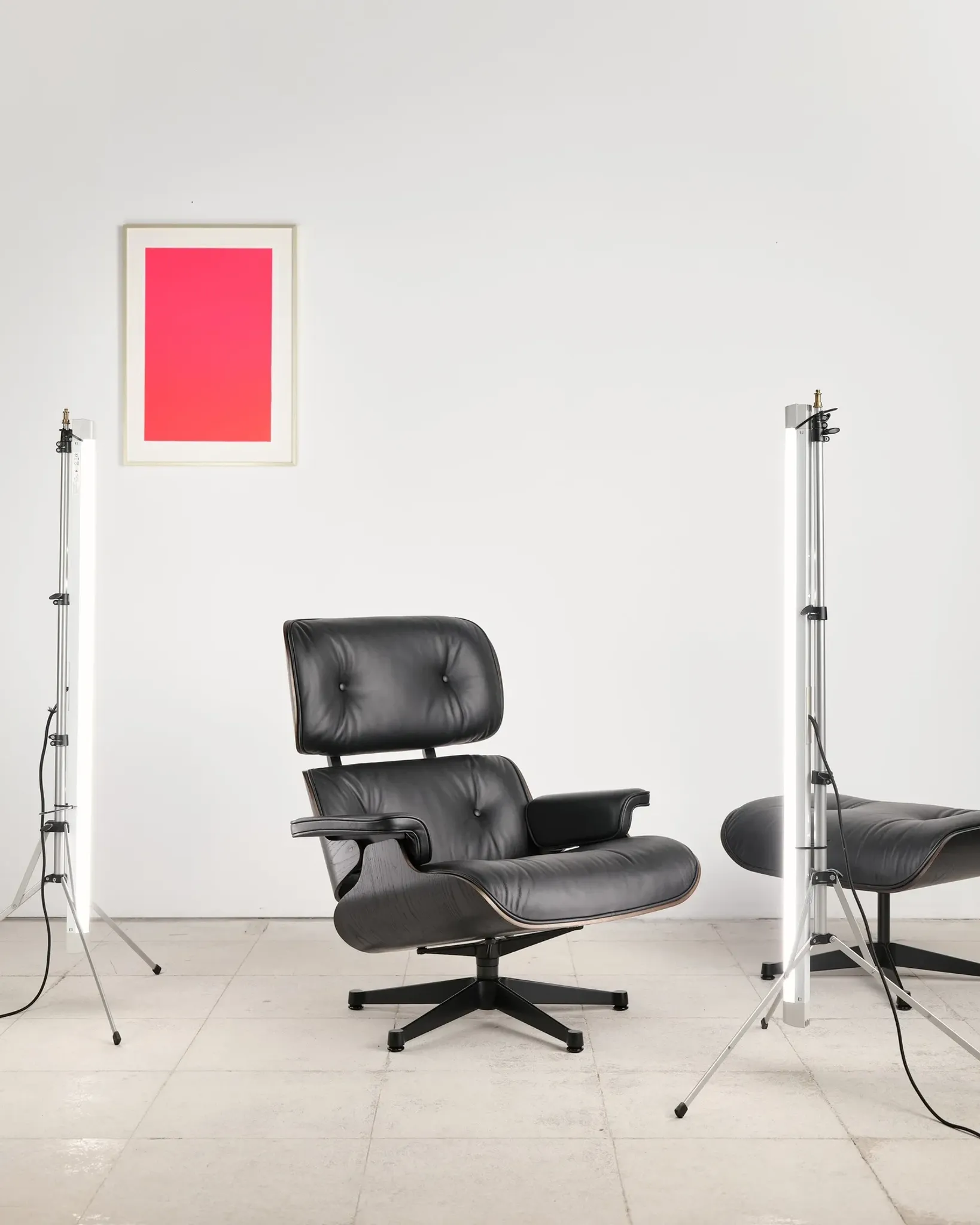 Lounge Chair and ottoman in black leather by Charles & Ray Eames, Vitra