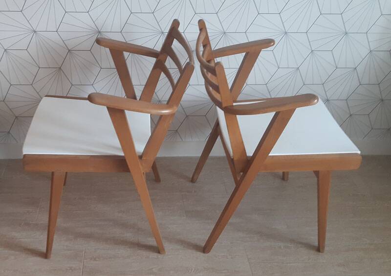 Pair of 1950s compass leg armchairs.