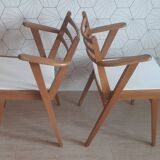 Paire de fauteuil pieds compas années 50.