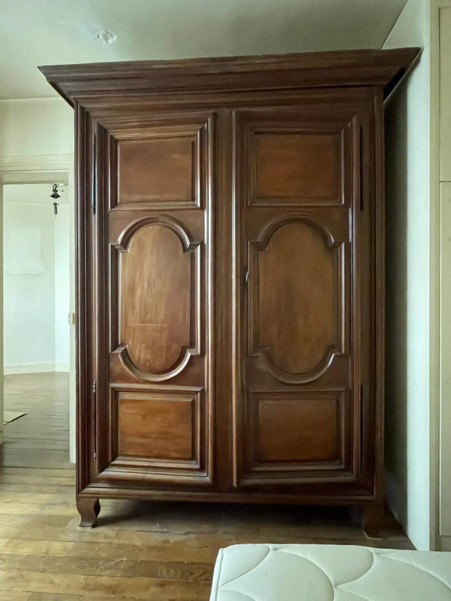 Louis XIV walnut wardrobe with arched panels – 18th century