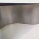 Vintage rectangular Space Age coffee table in steel and smoked glass.