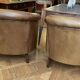 pair of camel leather club armchairs