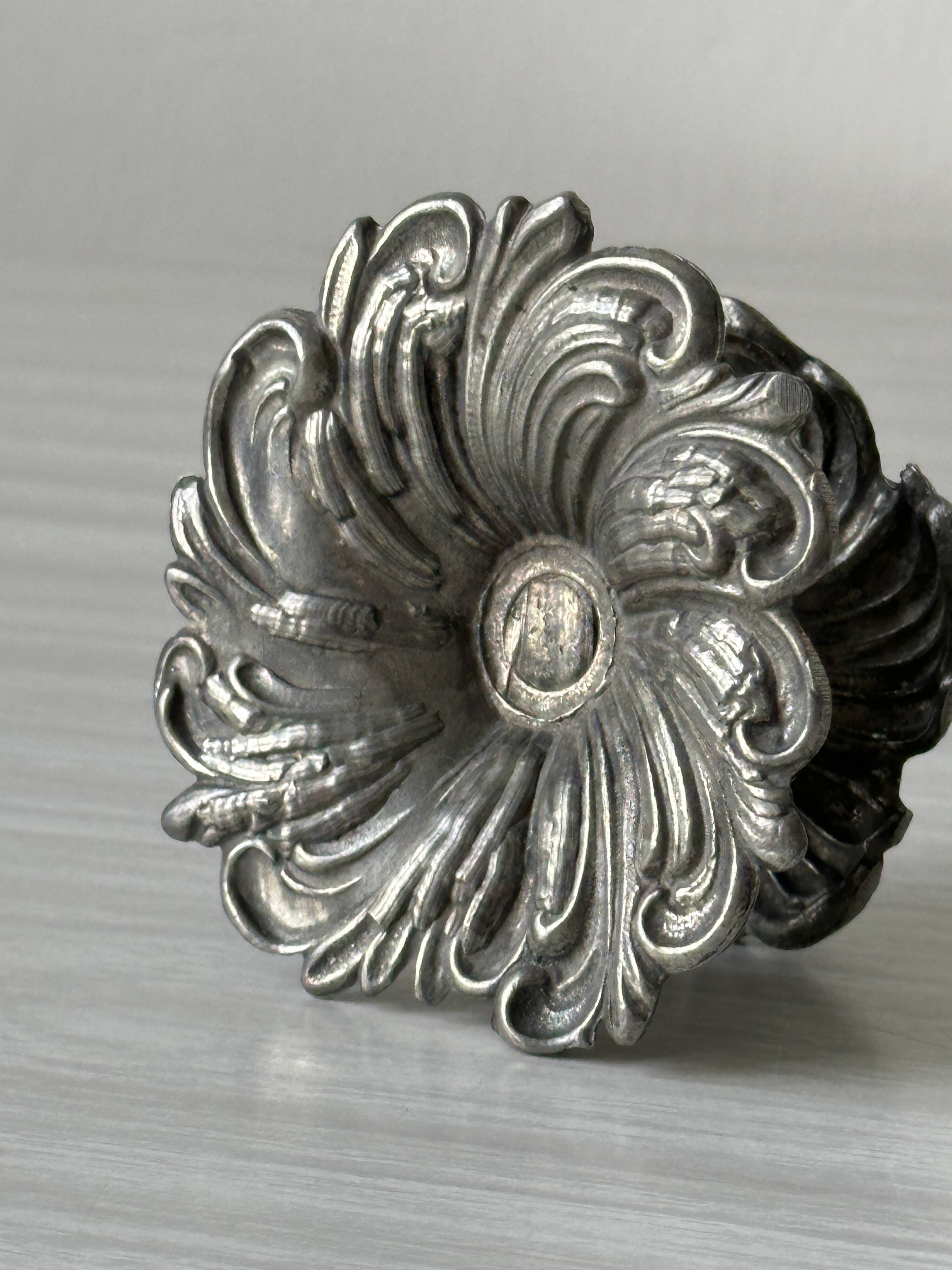 Metal candle holder.