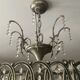 Cascading chandelier with crystal and silvered bronze pendants