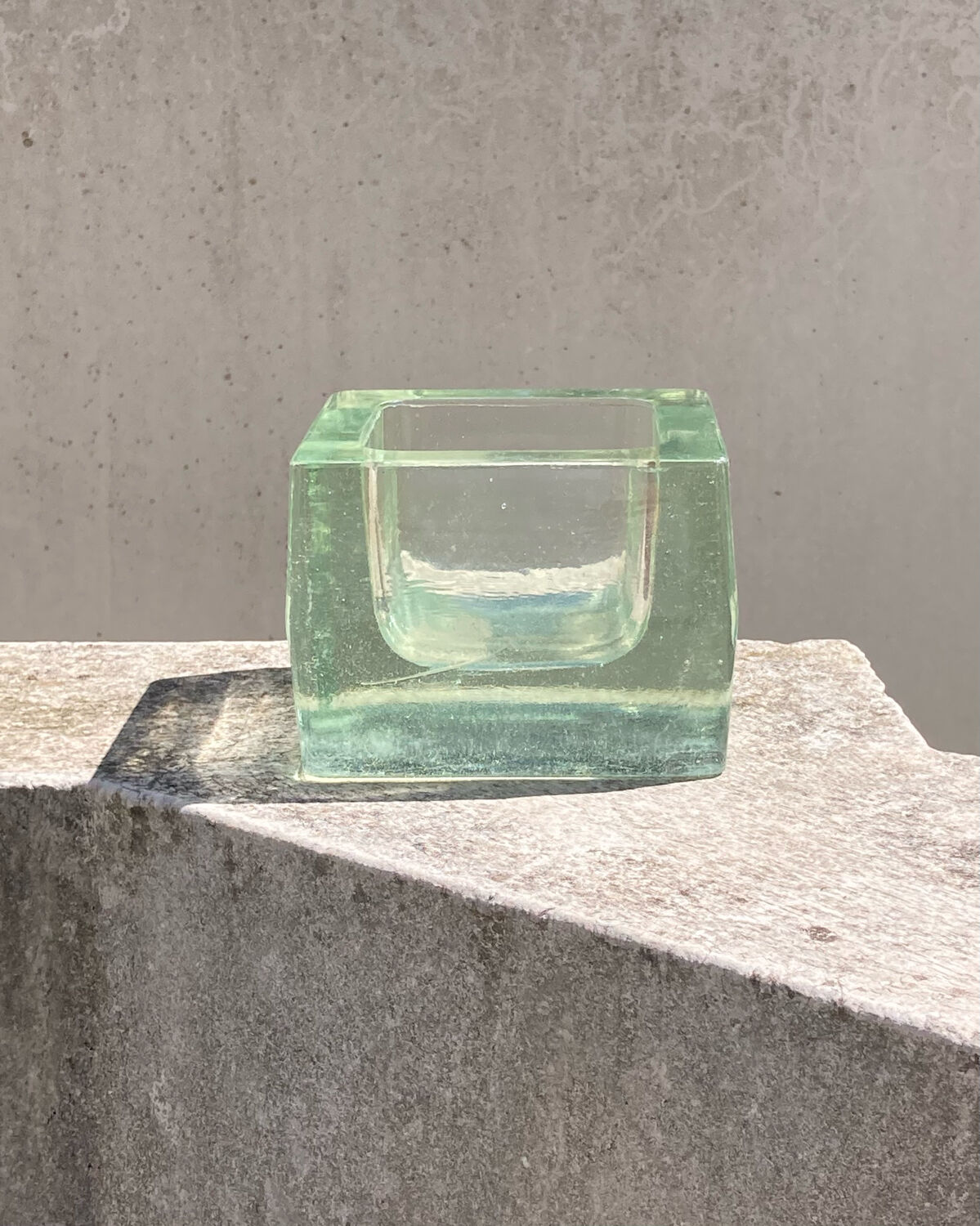 Empty pocket 70s molded glass