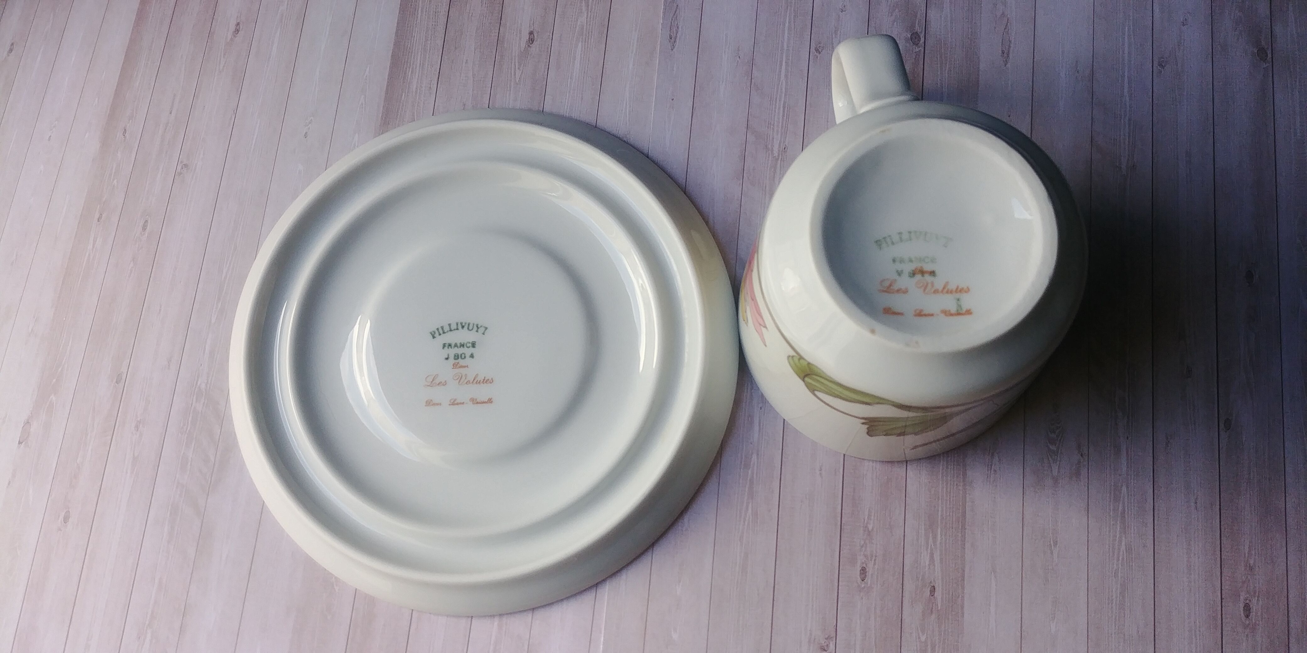 Two cups with herbal tea from the Faiencerie of Pillivuyt