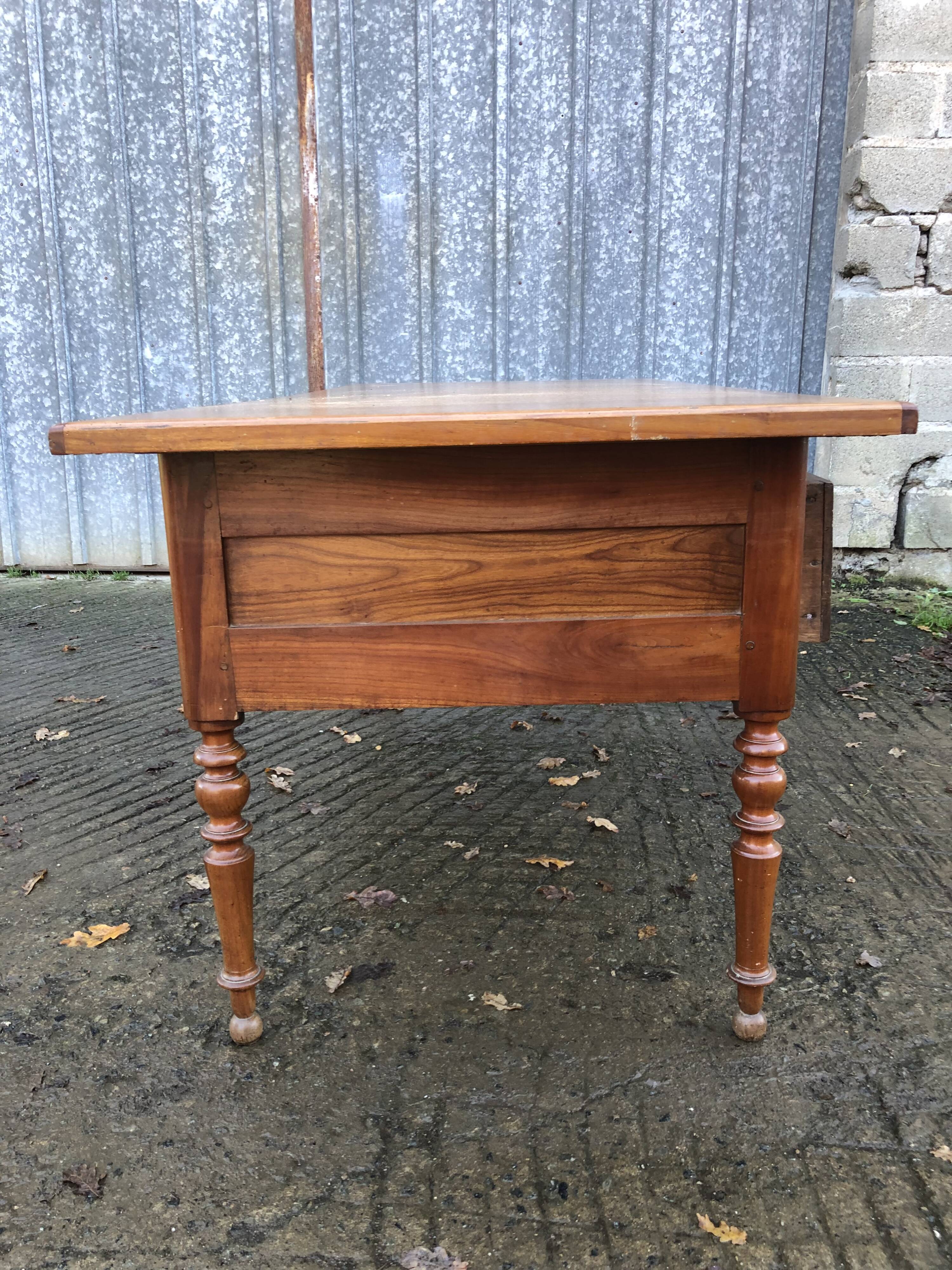 Solid cherry game table with 2 front drawers and panelled crosspieces.