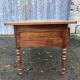 Solid cherry game table with 2 front drawers and panelled crosspieces.