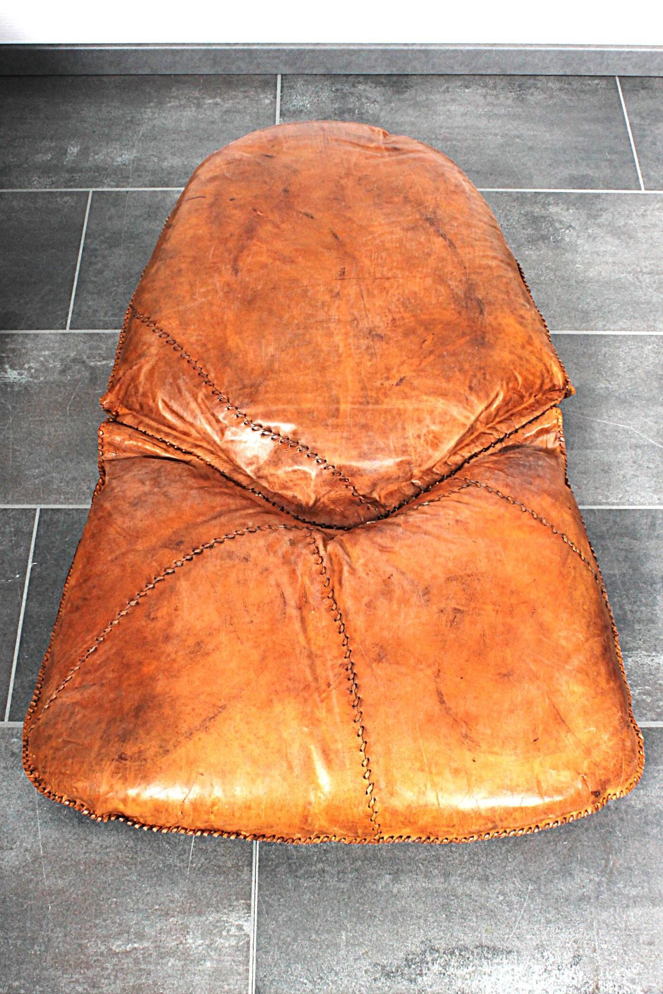 Brutalist oak lounge chair and ottoman, 1970s, set of 2