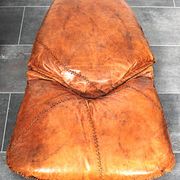 Brutalist oak lounge chair and ottoman, 1970s, set of 2