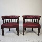 Pair of barrel chairs in turned wood and burgundy leather – Productio
