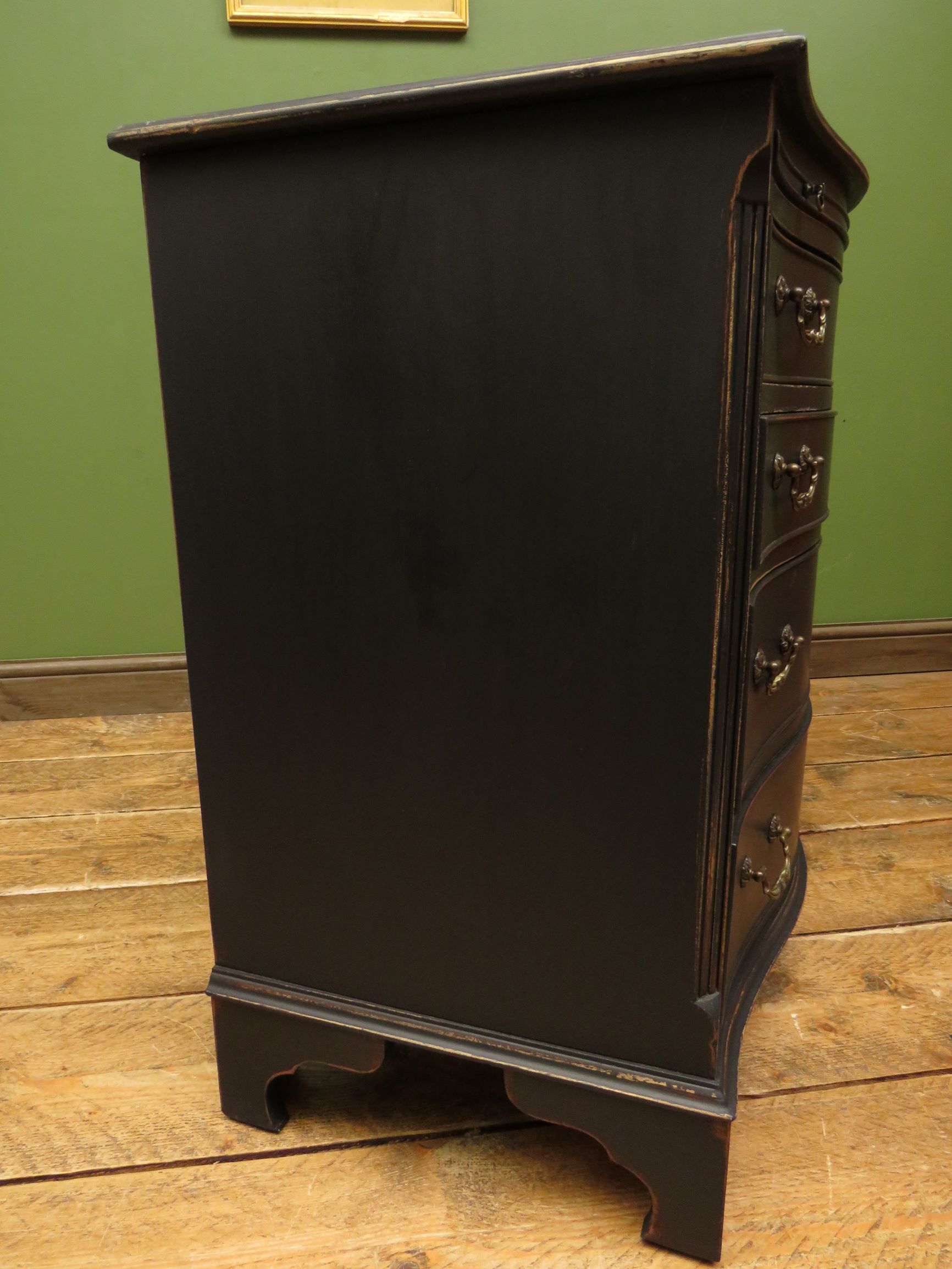 Antique black painted serpentine bachelors chest of drawers
