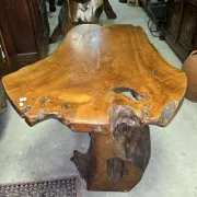Sculpted olive wood table, made from a root.