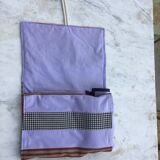 Silver metal covers in their pouch