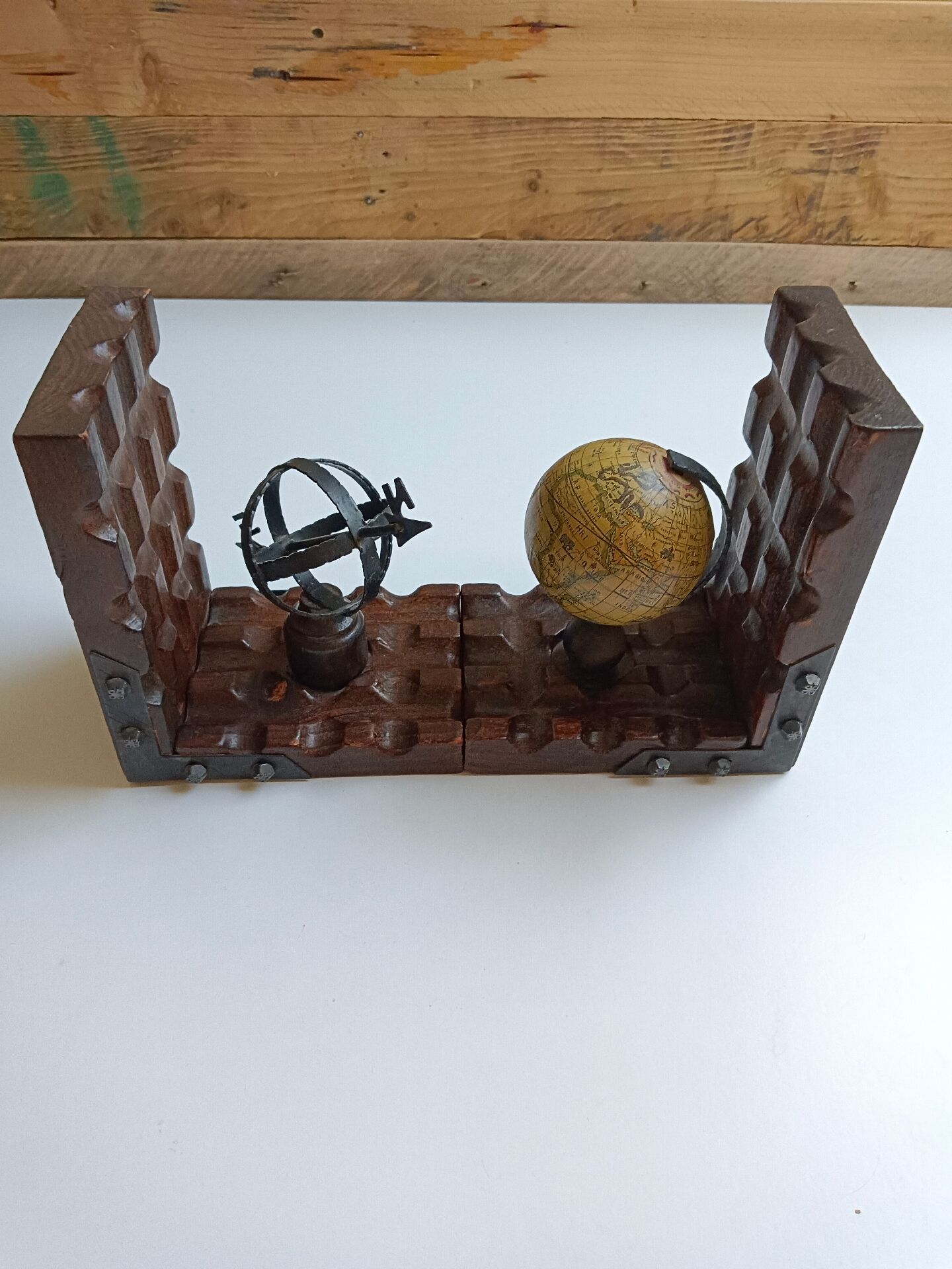 Wooden bookends globe world map