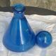 Blue bottle, glass vial for vintage perfume or liqueur.