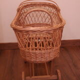 Vintage wicker cradle with wheels
