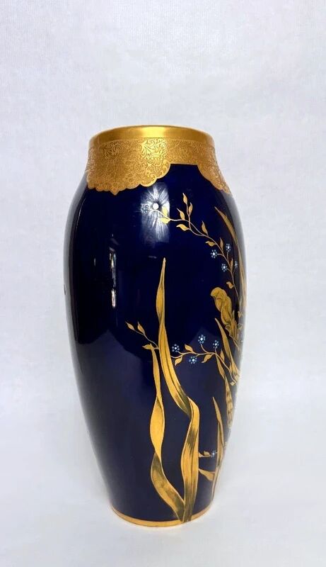 Lucien Michelaud, Limoges, large blue porcelain vase from the kiln with iris decoration.