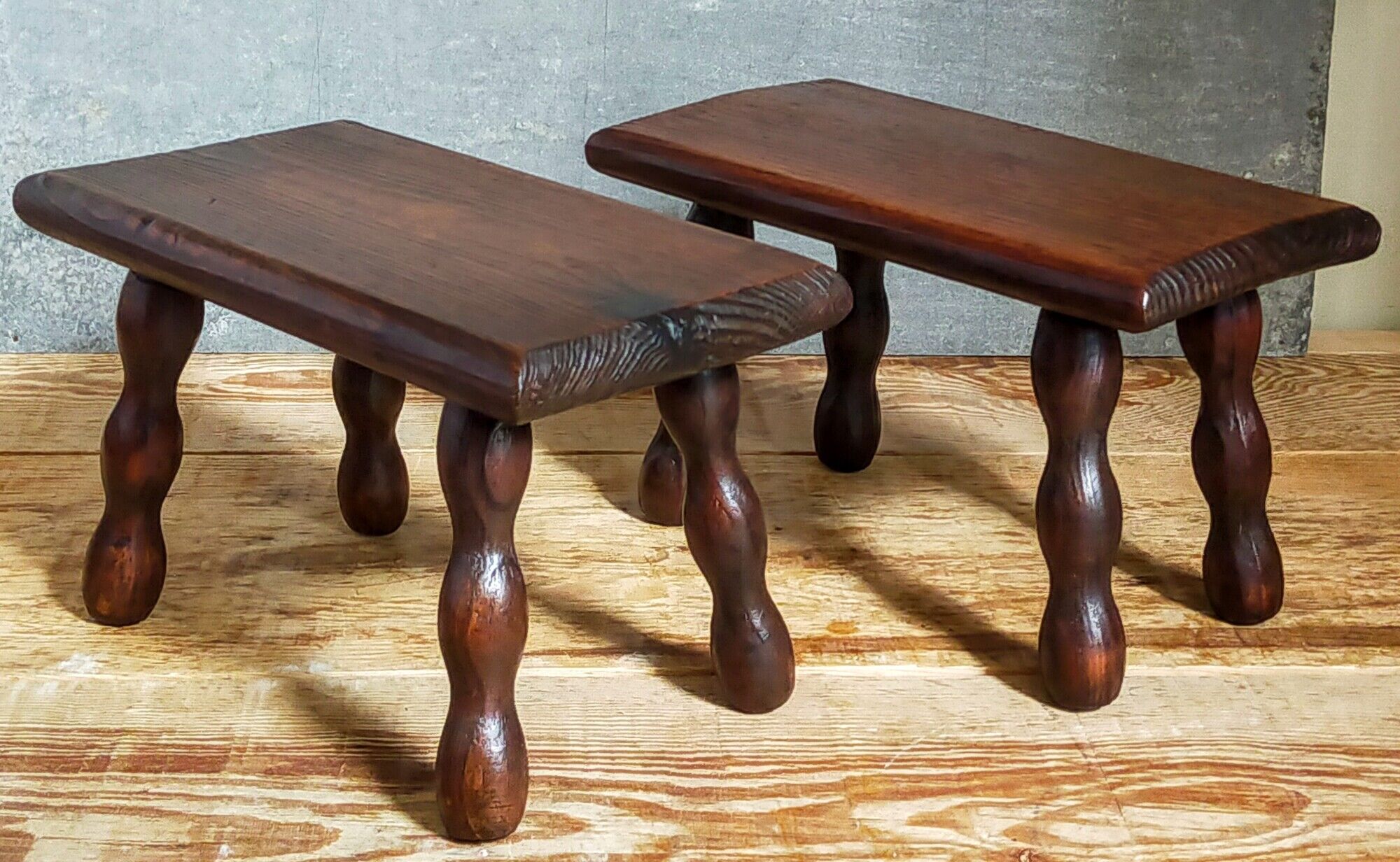 Pair of vintage solid turned wood footstools