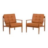 Rares fauteuils en teck Grete Jalk en cuir aniline cognac pour Cado