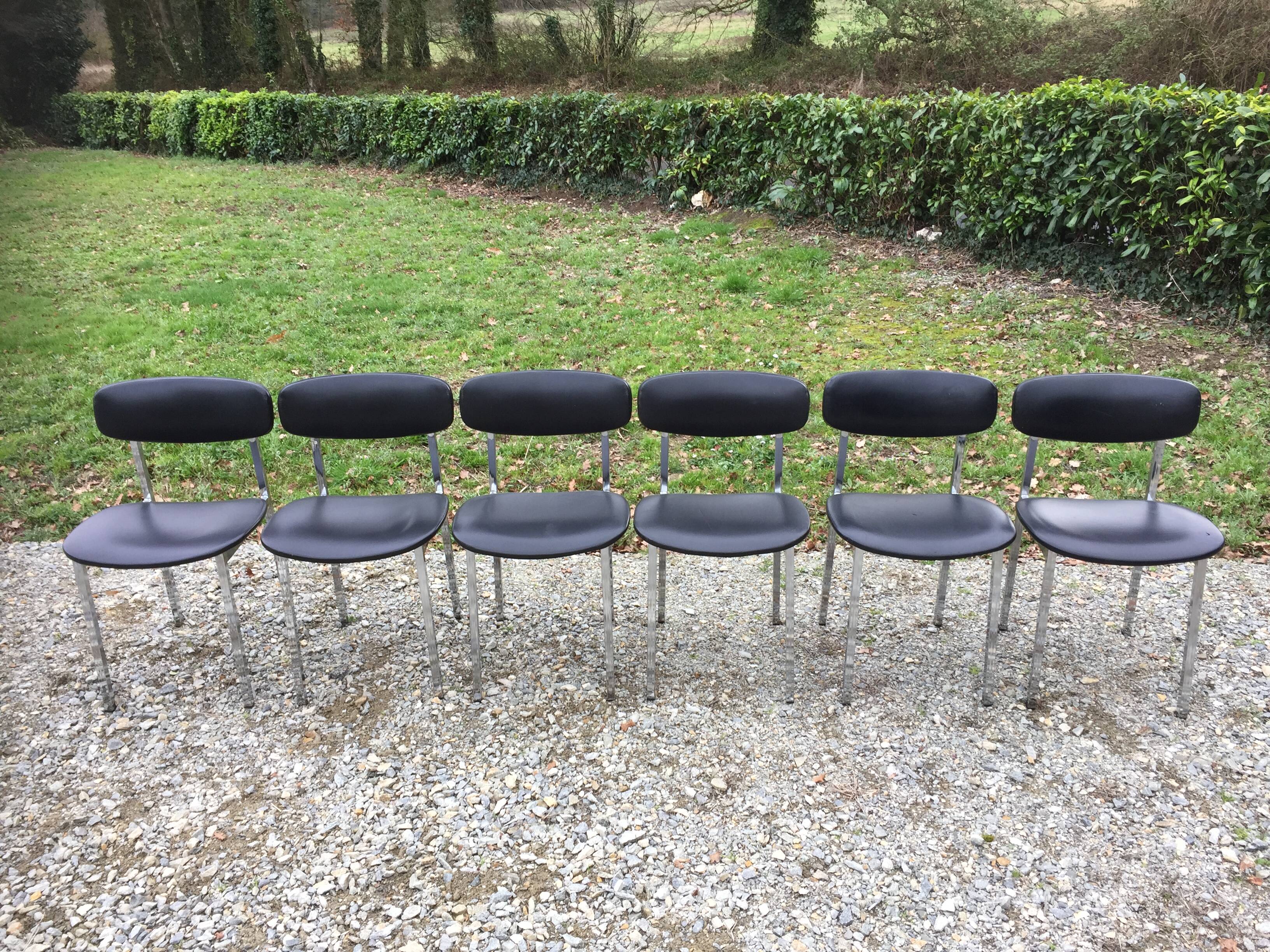 6 vintage chairs in black skaï with chrome metal tubular base.