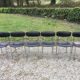 6 vintage chairs in black skaï with chrome metal tubular base.