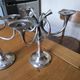 Ercuis pair of candlesticks model Cheverny in silver-plated metal with hunting horn decoration.