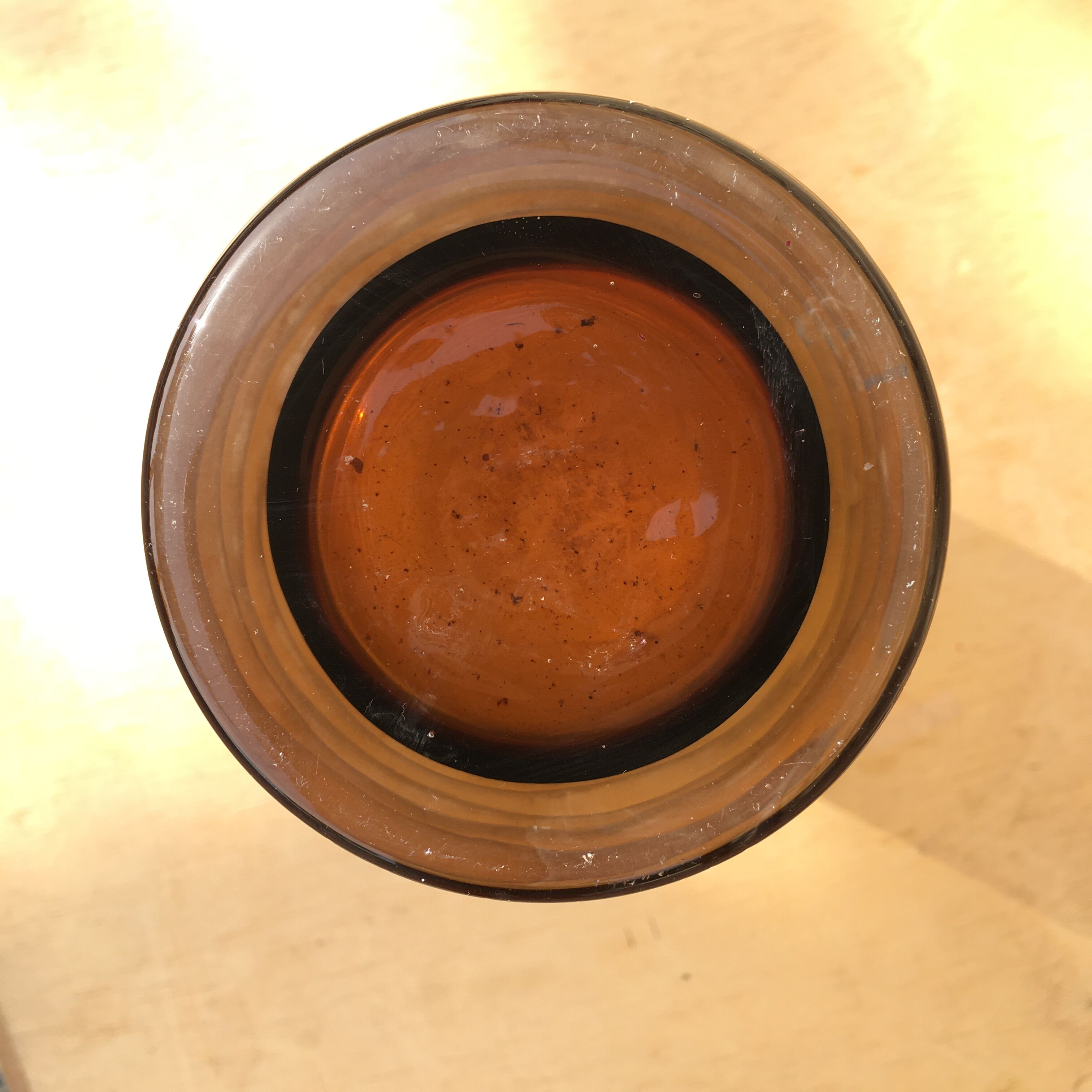 Frosted glass vase with amber scrolls