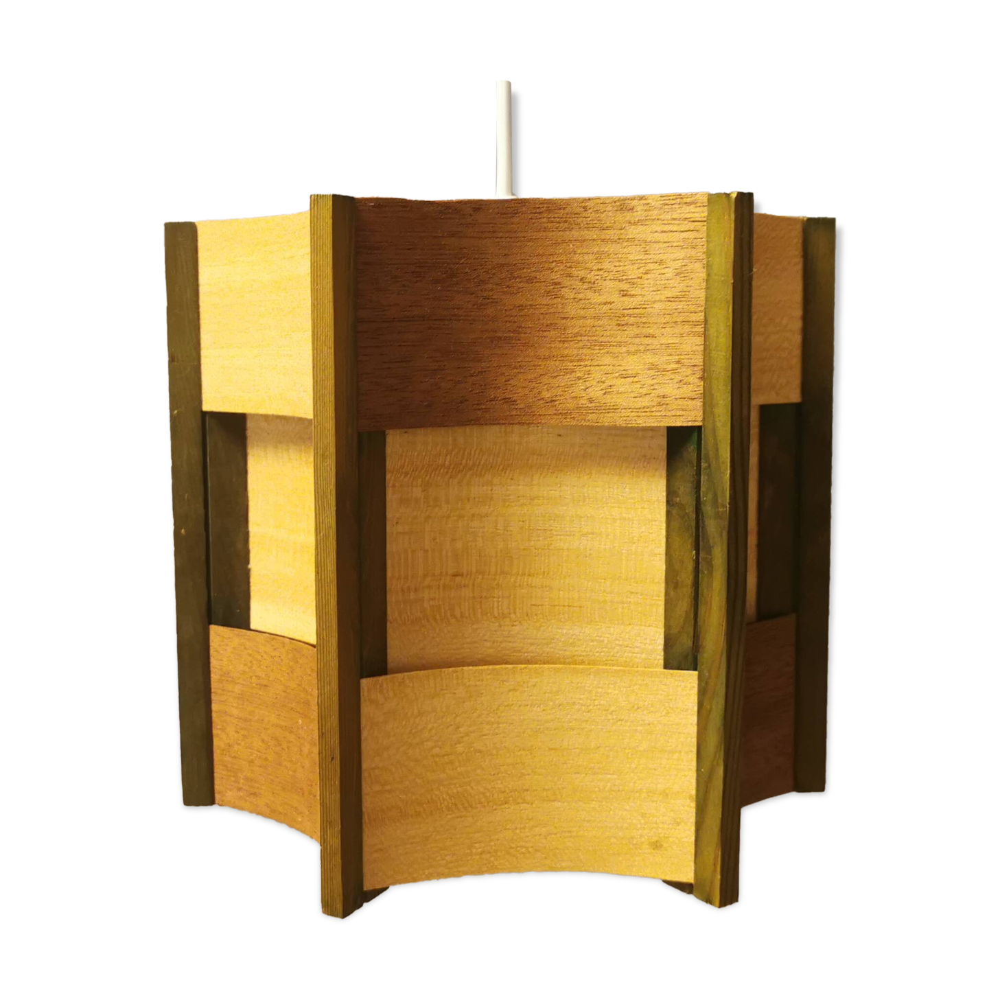 Older lamp in wood veneer, partially painted in green colour.